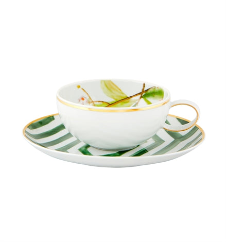 Vista Alegre | Amazonia Tea Cup And Saucer, featuring a botanical motif inside and green-striped rim, inspired by Alexandre Rodrigues Ferreira's exploration of Amazonia.