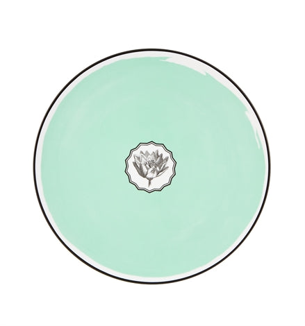 Vista Alegre | Lacroix Herbariae Charger Plate Green, featuring a mint-green glaze and a central black-and-white botanical motif, inspired by poppy, narcissus, lotus, dahlia, and thistle.