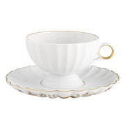 Vista Alegre | 200 Anos Tea Cup and Saucer: Elegant white porcelain with scalloped edges and gold accents, perfect for sophisticated tea settings.