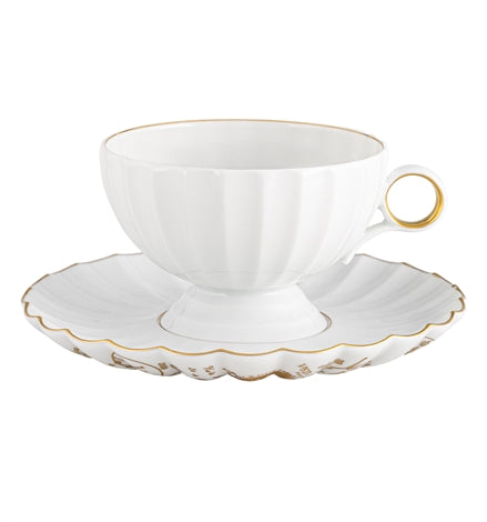 Vista Alegre | 200 Anos Tea Cup and Saucer: Elegant white porcelain with scalloped edges and gold accents, perfect for sophisticated tea settings.