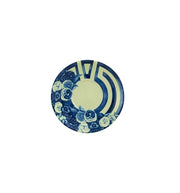 Vista Alegre | The Meaning Espresso Cup And Saucer featuring a white ceramic saucer with blue rose and stripe designs, viewed from above.