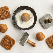 Nordic Ware | Gingerbread cookie stamps with intricate holiday designs, perfect for crafting festive treats. Includes gingerbread boy, girl, and house shapes.