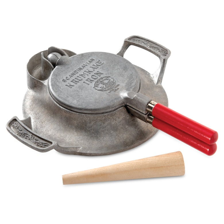 Nordic Ware | Norwegian Krumkake and Pizzelle Iron, showcasing a detailed metal pan with handle and wooden cone for making traditional Scandinavian and Italian cookies.