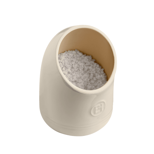 Emile Henry | Clay Salt Pig, a ceramic countertop keeper filled with coarse salt. Features a wide opening for easy access and moisture-wicking unglazed interior.