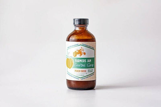 Farmers Jam | Peach Basil Cocktail Syrup - 8oz bottle, featuring a peach and tractor graphic, ideal for enhancing cocktails with a fruit-forward, handcrafted blend.