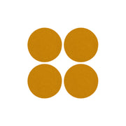 Graf Lantz - Bierfilzl Merino Wool Felt Round Coaster Solid 4 Pack: Turmeric, featuring four round, thick wool felt coasters ideal for protecting surfaces.
