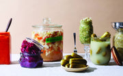 Havsnø Fine Kosher Norwegian Sea Salt amidst jars of pickled vegetables, ideal for fermentation and preserving, embodies Athens Cooks' culinary expertise and sustainable values.