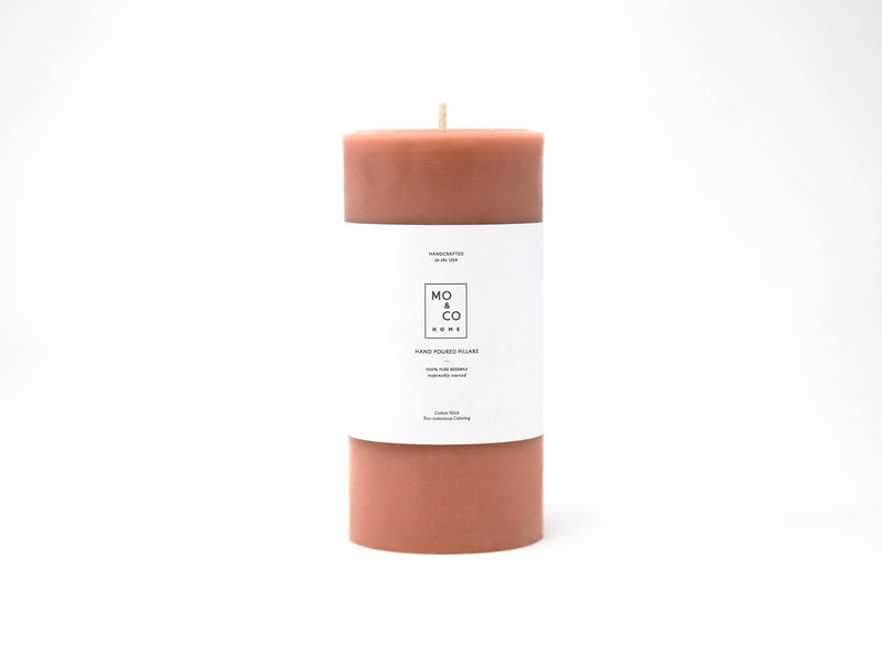 Mo&Co Home - 100% Beeswax Pillar Candles | Terra Cotta: 3x4 Inch, featuring a brown candle with a white label, eco-conscious, and hand-poured.