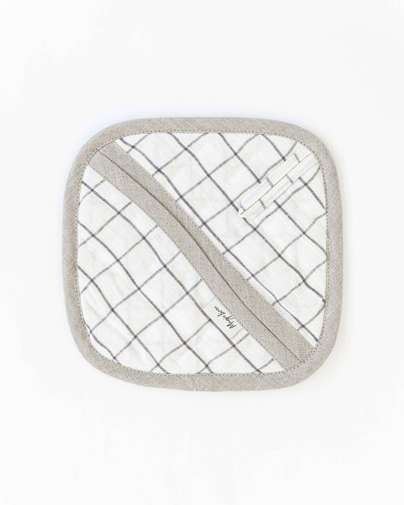 Linen pot-holder with quilted detailing and hanging loop, ideal for kitchen use. Part of the MagicLinen collection from Athens Cooks, perfect for stylish practicality.