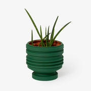 Areaware - Strata Plant Vessel: Blue, a ceramic planter with unique stacked shapes, inspired by sculptural heritage, designed to enhance personal space.