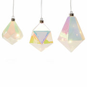 MoMA | LED Glass Prism Ornament featuring iridescent glass and LED lights, perfect for adding an ethereal touch to holiday decor with versatile placement.