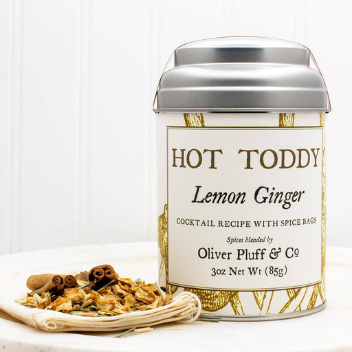 Oliver Pluff & Company - Lemon Ginger Hot Toddy Kit with spice canister, muslin bag, and dried spices for crafting soothing hot toddies at home.