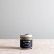 Jacobsen Salt Co. - Rosemary Salt in a clear jar with white lid, 3.5 oz. A coarse, herbaceous seasoning ideal for enhancing roasted lamb and baked goods.