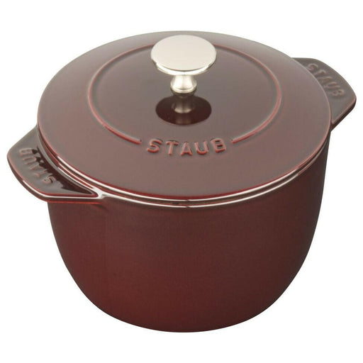 Staub | 1.5 Qt Petite French Oven - Black, compact cast iron design with Chistera lid, ideal for stovetop-to-table cooking and presentation of grains and oatmeal.