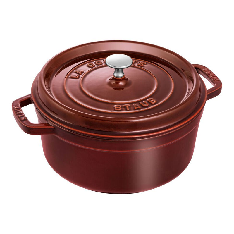 Staub Round Cocottes - 4 qt - Grenadine, a cast iron pot with a self-basting lid, ideal for slow-cooking and perfect for kitchen-to-table presentations.