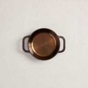 Smithey | No. 6 Dual Handle Skillet, close-up view showcasing the skillet's sturdy build and dual handles, ideal for versatile cooking.