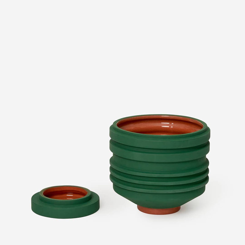 Areaware - Strata Plant Vessel: Green, a ceramic planter with layered shapes, inspired by Simone Brewster's designs, perfect for enhancing kitchen spaces with style.