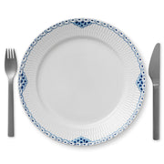 Royal Copenhagen | Princess Plate, 27cm, features a hand-painted blue scalloped rim, paired with stainless-steel cutlery, ideal for elegant dining settings.