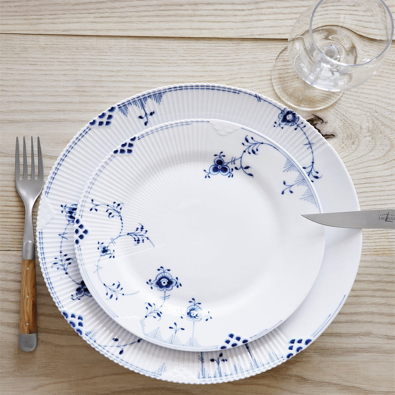 Royal Copenhagen Blue Elements Plate, 22cm, with delicate blue floral patterns, paired with a wooden-handled fork on a light wooden table.