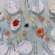 Royal Copenhagen Blue Elements Plate, 22cm, elegantly set with caviar and champagne, showcasing its intricate, hand-painted design in a refined dining setting.