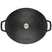 Staub Wide Oval Dutch Oven in Graphite Grey, featuring generous oval design for optimal cooking surface, ideal for braising and baking, with self-basting lid for moisture retention.
