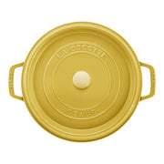 Staub | Round Cocottes - 5.5 qt Citron: Top-down view of mustard-yellow Staub cast-iron Dutch oven with lid, showcasing twin side handles and center knob.
