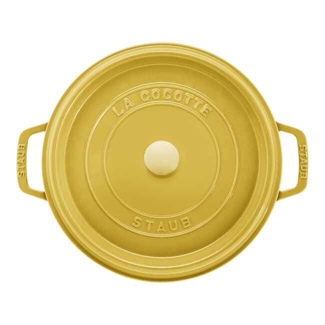 Staub | Round Cocottes - 5.5 qt Citron: Top-down view of mustard-yellow Staub cast-iron Dutch oven with lid, showcasing twin side handles and center knob.