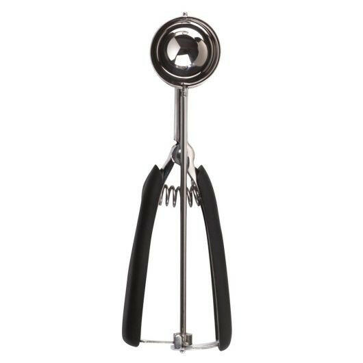 OXO Cookie Scoops - Medium: A stainless steel scoop with a spring-loaded handle and non-slip grip, ideal for shaping consistent 2.75-inch cookies, dishwasher safe.