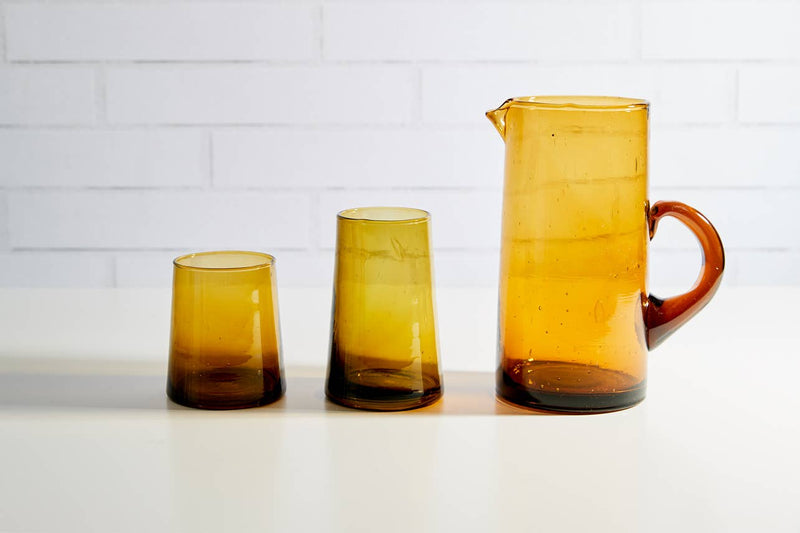 Moroccan Cone Glassware Small - Amber - Set of 6, featuring hand-blown, recycled glass with visible bubbles and organic forms, ideal for beverages or decorative vases.