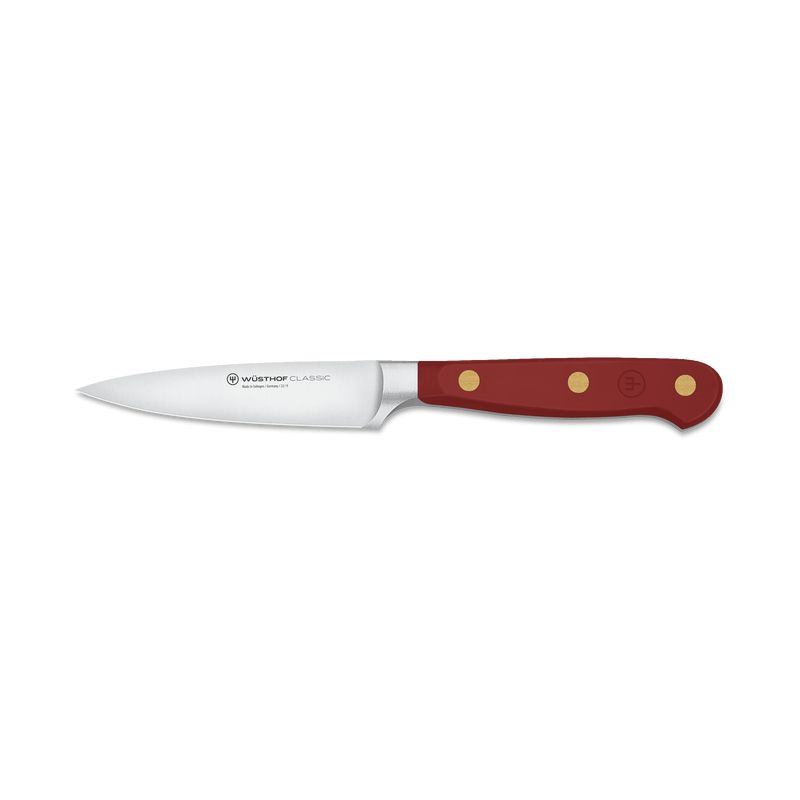 Wüsthof | CLASSIC TASTY SUMAC 3 1/2 Paring Knife featuring a sharp blade and ergonomic red handle, ideal for precise kitchen tasks.