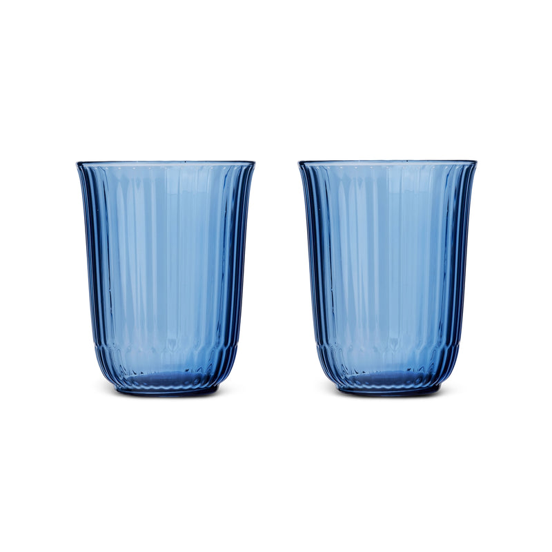 Royal Copenhagen | Waves Highball Glass, Blue, Set of 2: Two elegant, blue-tinted tumblers with fluted ridges, perfect for cocktails and summer drinks.