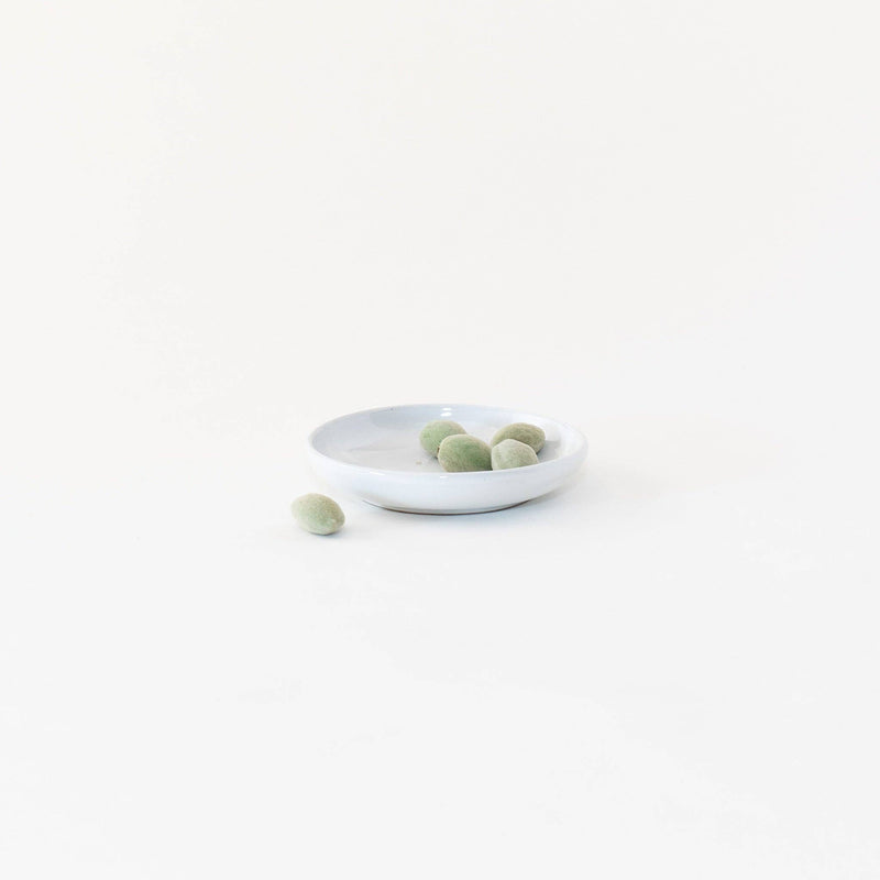 Sarah Kersten - Olive Dish: Basin Collection: Yosemite displayed with green olives, showcasing its elegant and versatile design, perfect for appetizers or sides.