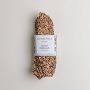 Potters Table - Seeded Olive Oil Flatbreads, hand-stretched and seed-coated, ideal for cheese boards and elegant gatherings, embodies artisanal quality from Athens Cooks' curated specialty foods collection.