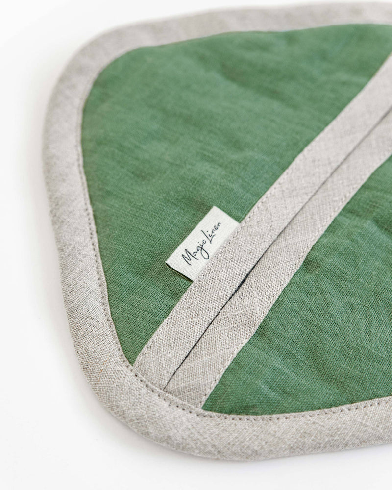 MagicLinen linen pot-holder with a white label, showcasing quilted detailing and a hanging loop, perfect for kitchen use.