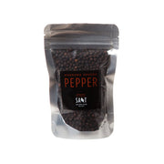 San Juan Island Sea Salt | Madrona Smoked Pepper Grinder, featuring a clear container with visible pepper flakes, ideal for enhancing culinary creations at Athens Cooks kitchen store.