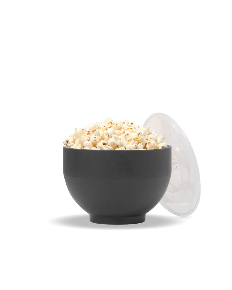 W&P Standard Size Popcorn Popper in silicone with a clear lid, holding freshly popped popcorn, ideal for making microwave popcorn efficiently.