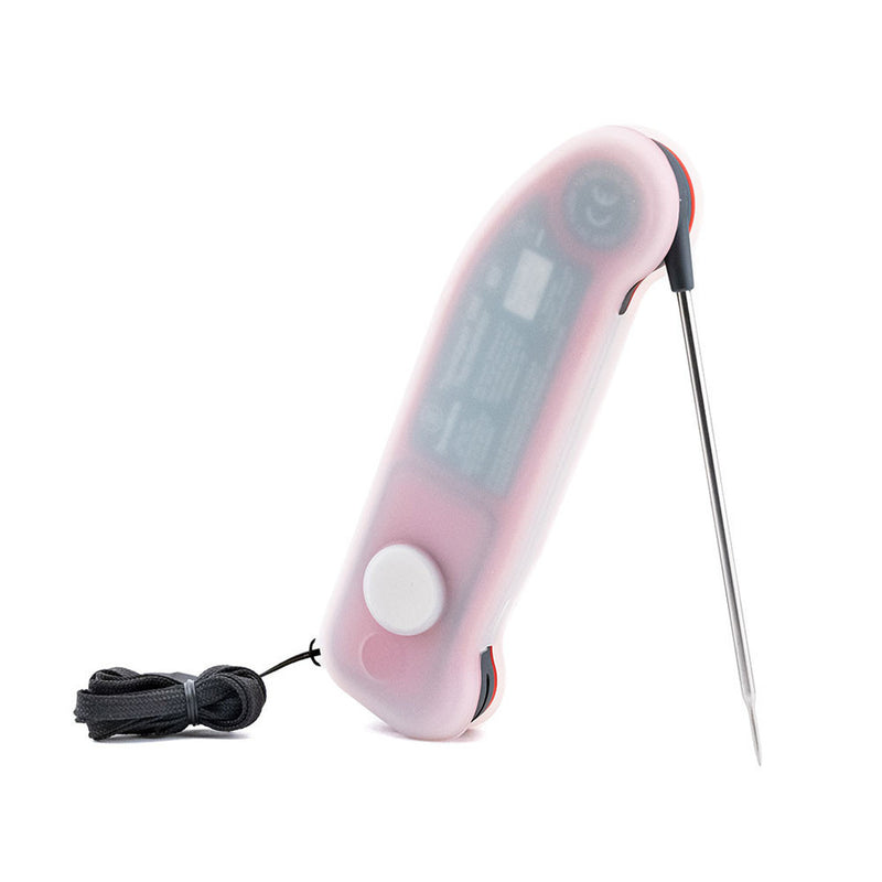 Thermoworks Thermapen ONE Silicone Boot, featuring a magnetic, glow-in-the-dark design, resembles a sleek remote control, ideal for precision cooking at Athens Cooks.