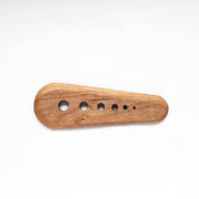 Collin Garrity - Herb Stripper: Cherry, a handcrafted wooden tool with circular holes for stripping herbs, also scrapes seeds. Made in St. Louis, USA.