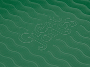 Great Jones | Patty Cake - Broccoli, featuring a wavy, corrugated bottom for easy release and even baking, suitable for kid-friendly cooking.