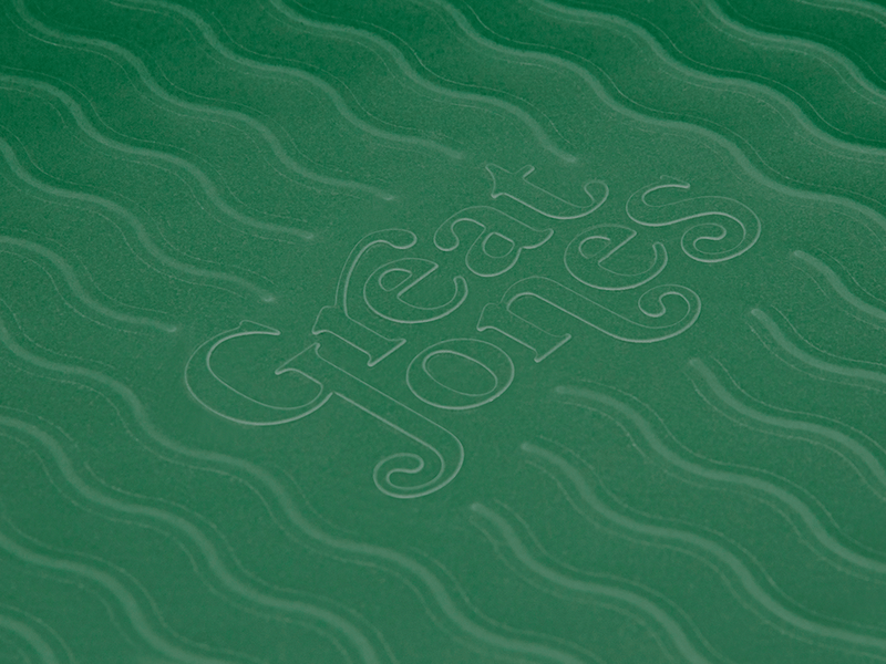 Great Jones | Patty Cake - Broccoli, featuring a wavy, corrugated bottom for easy release and even baking, suitable for kid-friendly cooking.