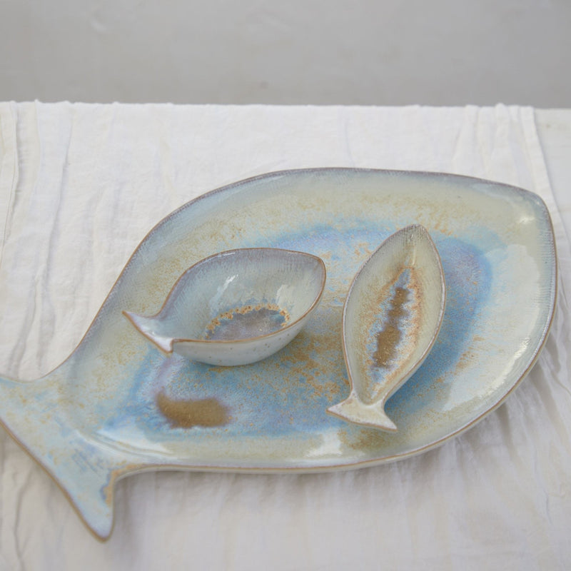 Large Mackarel Serving Platter by Casafina, featuring fish-shaped bowls on a plate, ideal for serving and enhancing any dining experience.