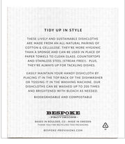 Bespoke Provisions - Modern Tulip Swedish Dishcloth, packaged with a white paper label featuring black text, describing product use and care instructions.