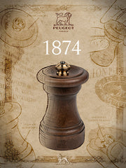 Peugeot | 1874 Manual Wooden Pepper Mill Antique Patina, featuring a classic design with brass knob, inspired by the original Z model from 1874.