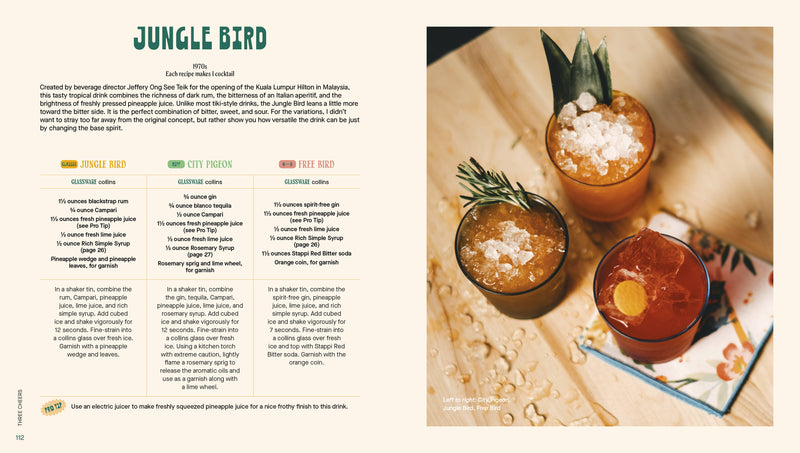 Penguin Random House LLC - Three Cheers cocktail book spread featuring Jungle Bird recipes and variations, showcasing finished drinks on a wooden surface.