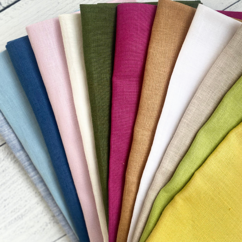 Crown Linen Designs' washed linen napkin sets in Harvest Gold, showcasing elegant fabric textures, perfect for enhancing your dining table.