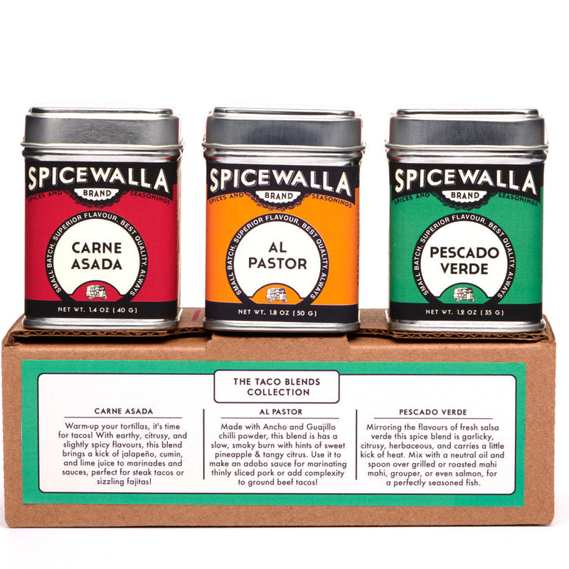 Spicewalla | Street Taco Spice Gift Set: A trio of metal tins featuring Carne Asada, Al Pastor, and Pescado Verde taco seasoning blends on a The Taco Blends Collection box.