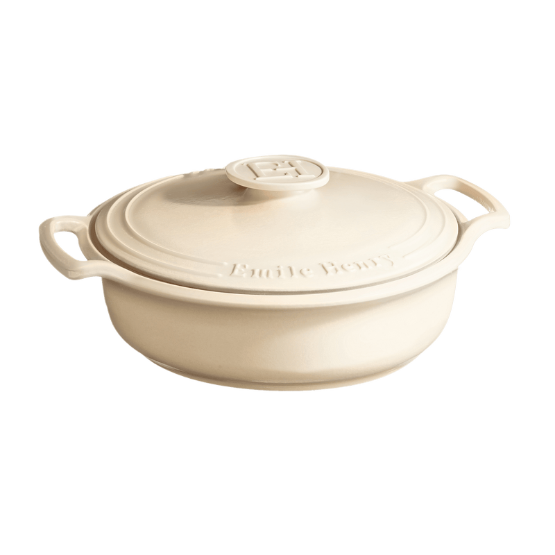 Emile Henry | Sublime Braiser, Indigo, 4 QT: A round, ceramic-covered casserole with lid and handles, ideal for slow-cooking, baking, and versatile stovetop or oven use.