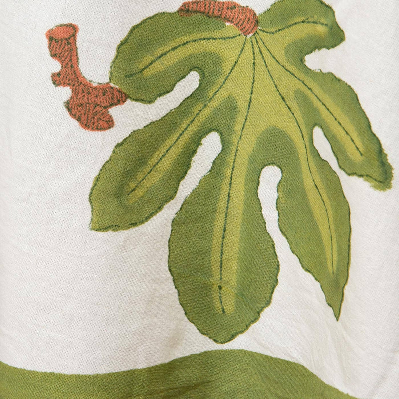 Couleur Nature - Fig Red & Green | French Tablecloths: 71 x 71 features a green fig leaf print on white cotton, ideal for kitchen elegance.