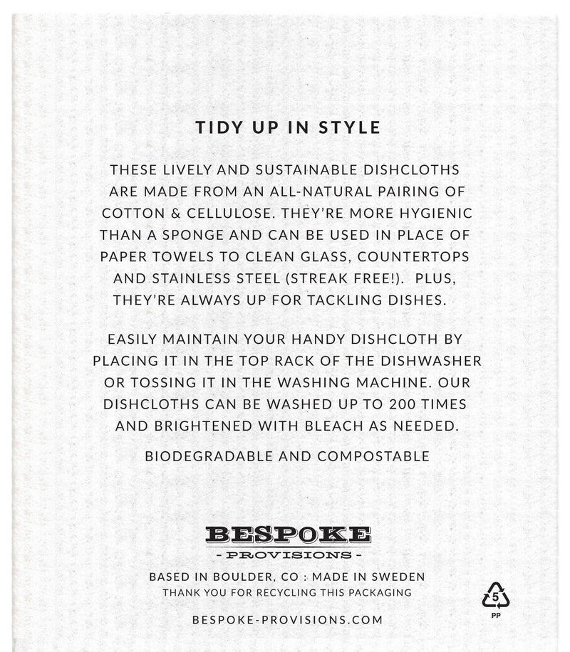 Bespoke Provisions Merry Christmas Swedish Dishcloth packaging back, detailing reusable, biodegradable cotton/cellulose composition, care instructions, and branding from Athens Cooks.