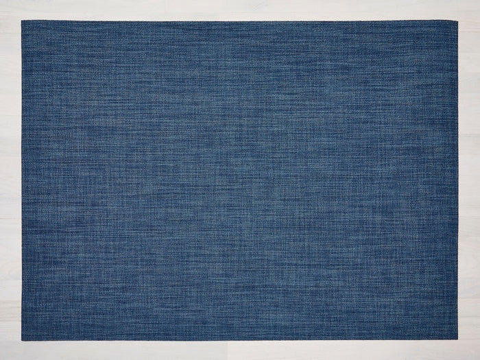 Chilewich | Boucle Rugs - Blueberry features a detailed blue fabric pattern, ideal for adding elegance and functionality to dining or kitchen spaces.